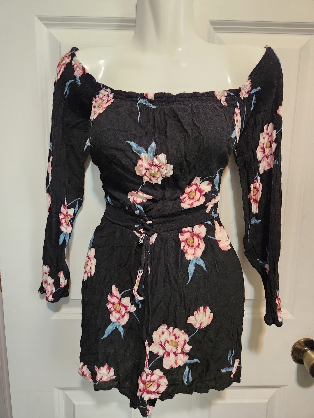 Kendall & Kylie Black Floral Off-Shoulder Romper with Pink and Blue Accents